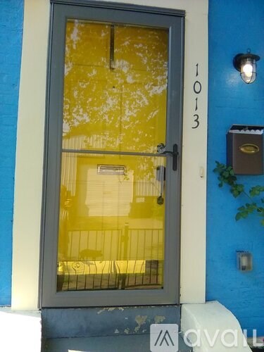 A door with a number 1013 on it.