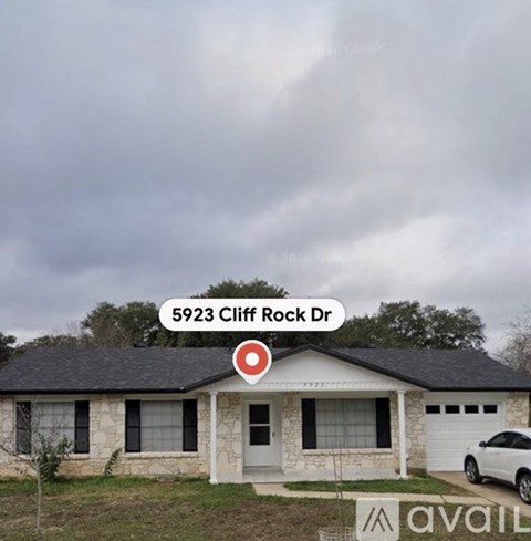 A house with the address 5923 Cliff Rock Dr is displayed.
