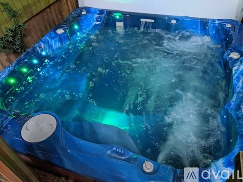 A hot tub with bubbles and lights.