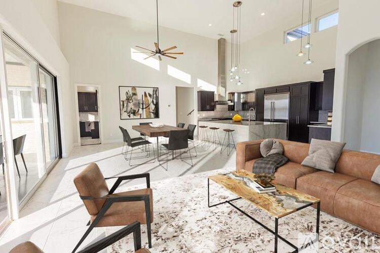 A modern living room with a brown sofa and a coffee table.