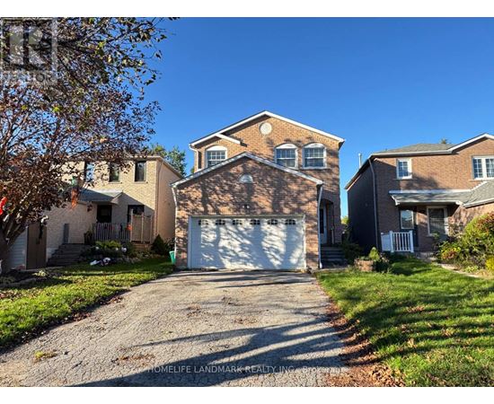 A house with a garage is for sale.