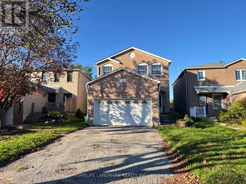 A house with a garage is for sale.