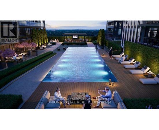 A poolside scene with people relaxing and a realtor logo.