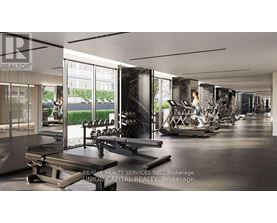 A gym with a variety of equipment including treadmills, weights, and exercise machines.