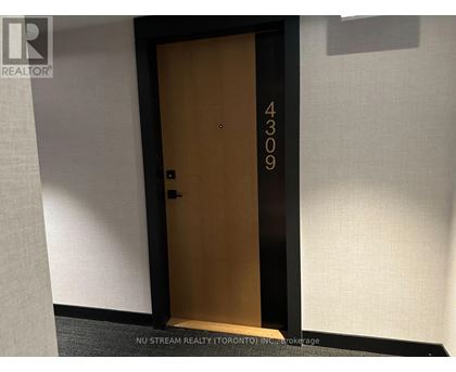 A brown door with the number 4309 on it.
