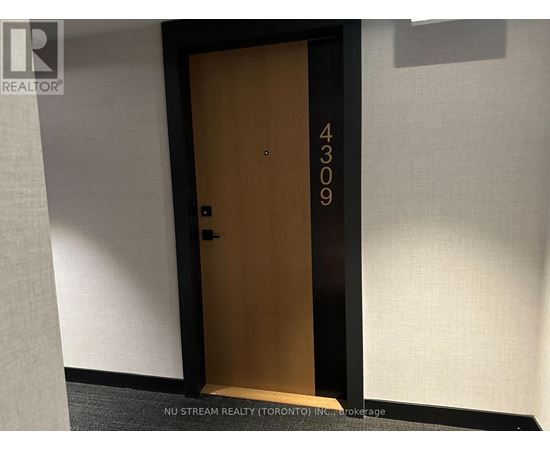 A brown door with the number 4309 on it.