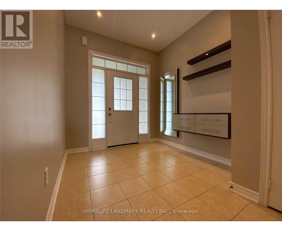 A spacious room with a door and a window.