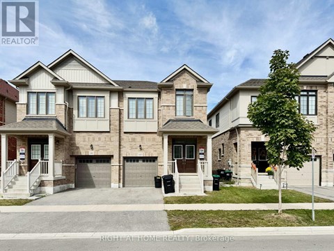 A row of houses with a sign that says "REALTOR" on the left.