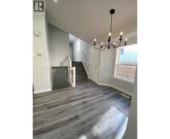 A realtor logo is on the top left of the image.