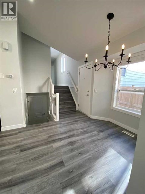 A realtor logo is on the top left of the image.