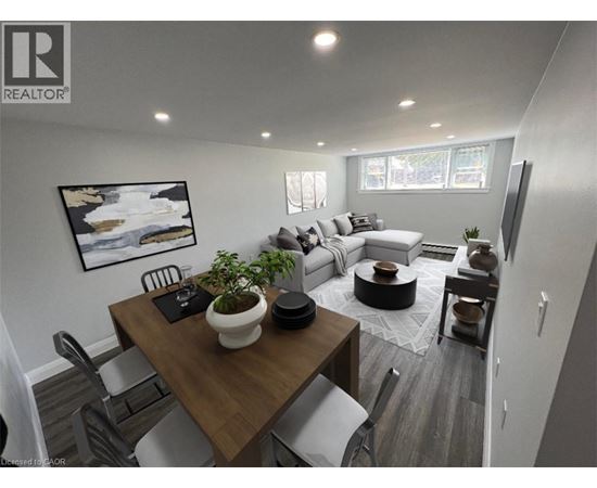 A modern living room with a dining table and chairs.