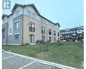 A building with a sign that says RE/MAX Realty Services Inc.
