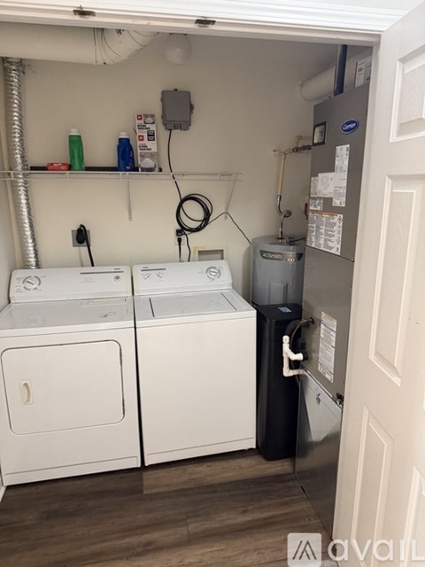A laundry room with a washer and dryer.