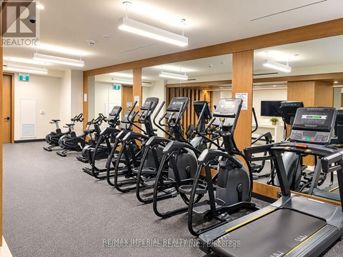 A gym with treadmills and exercise bikes.
