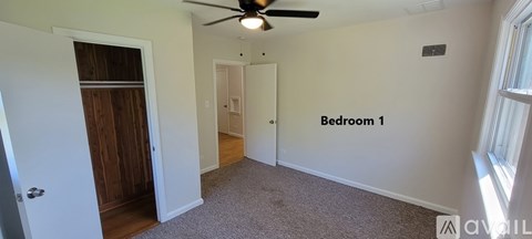 A room with Bedroom 1 written on the wall.