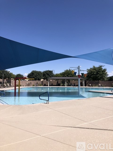 A pool with a blue shade over it.