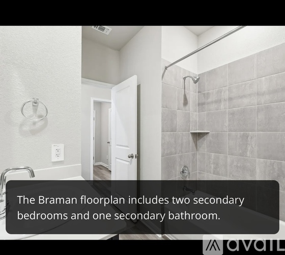 A bathroom with a shower and a text box that says the Braman floorplan includes two secondary bedrooms and one secondary bathroom.