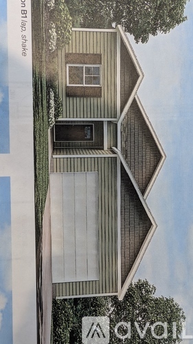 A house with a triangular facade is for sale.