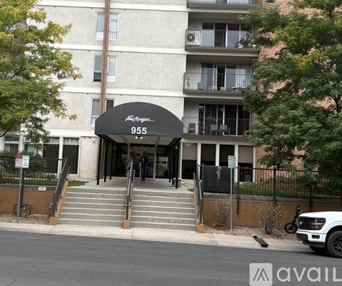 The entrance to a building with the number 955 on it.