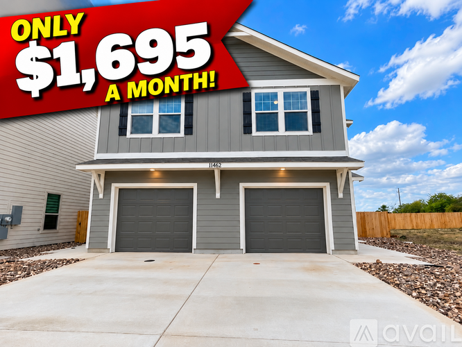 A house with a sign that says "ONLY $1,695 A MONTH!" is for sale.