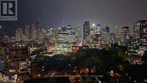 A cityscape at night with the Sutton Group-Admiral Realty Inc. logo in the bottom right corner.