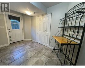 A room with a table and chairs in it.