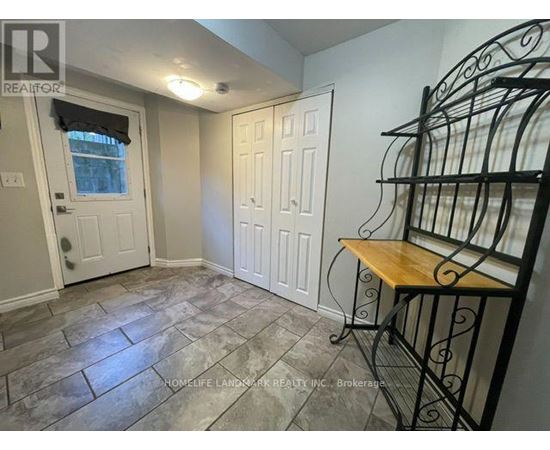 A room with a table and chairs in it.