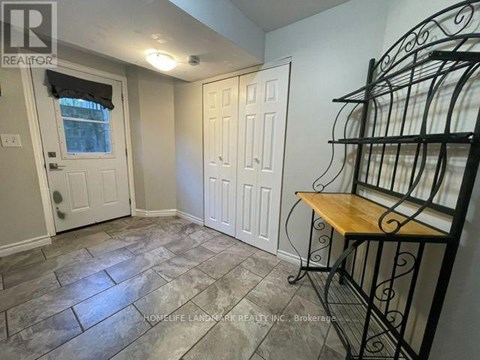 A room with a table and chairs in it.