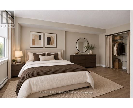 A well-lit bedroom with a large bed and a wooden dresser.