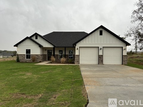 A two-car garage is attached to a house.