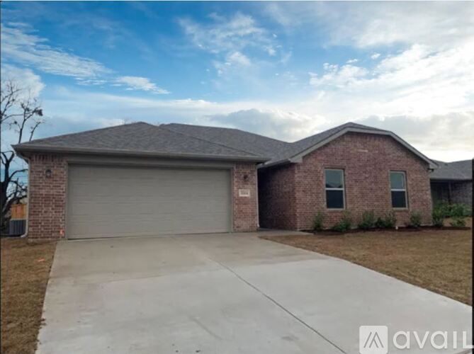 A house with a garage door that says "available" on it.