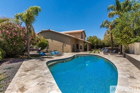 A house with a pool in the backyard.