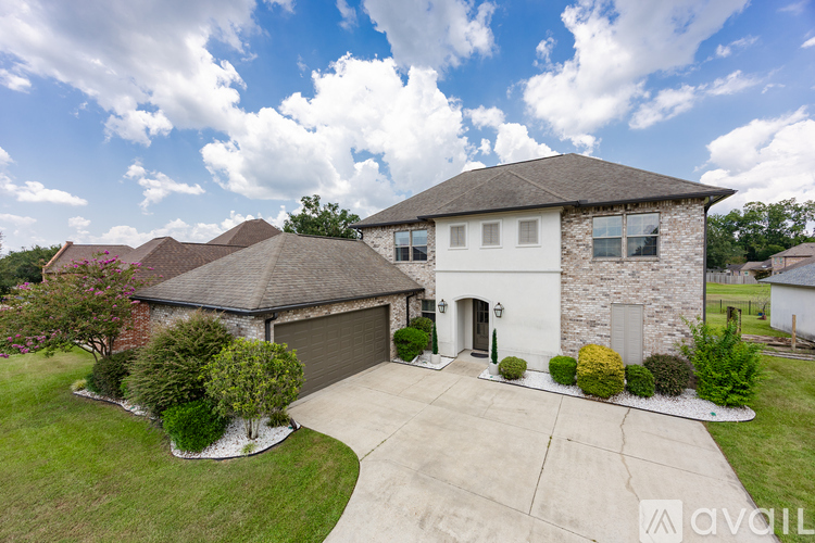 A house with a driveway and a garage.