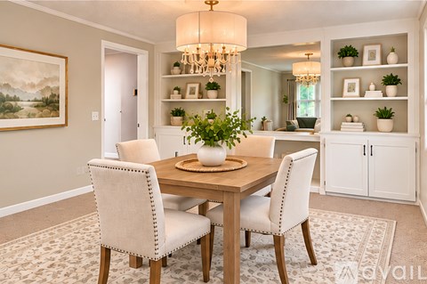 A dining room with a wooden table and chairs.