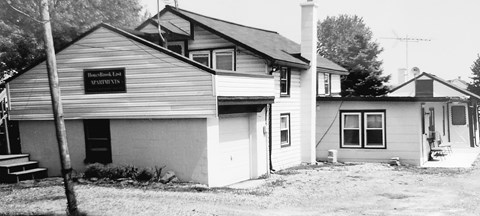 A sign on a building says "Bedford Lane".