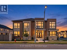 A modern house with a brick facade is for sale through EXP REALTY, Brokerage.