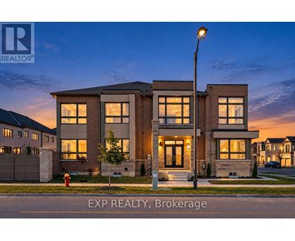 A modern house with a brick facade is for sale through EXP REALTY, Brokerage.