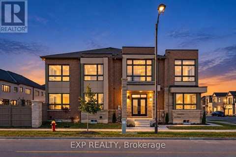 A modern house with a brick facade is for sale through EXP REALTY, Brokerage.