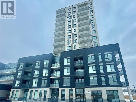 A tall building with a sign that reads "Corban Horizon Realty" in front of it.