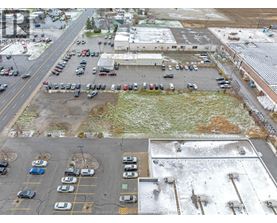 A parking lot with cars parked in it.