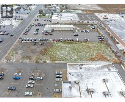 A parking lot with cars parked in it.