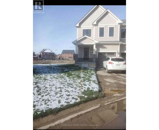 A house with a car parked in front of it.