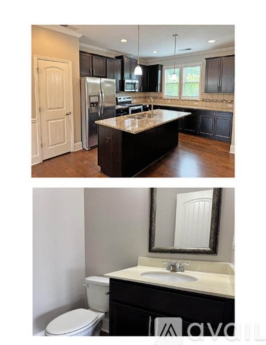 A modern kitchen with dark wood cabinets and a white countertop.