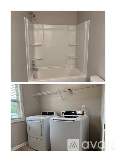A white bathroom with a toilet, a washing machine and a dryer.