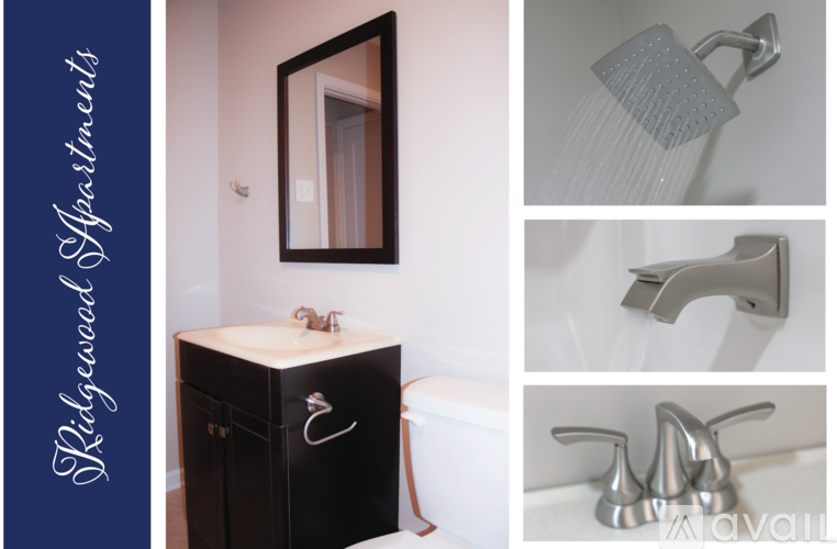 A collection of bathroom items including a mirror, shower head, faucet, and a cabinet.