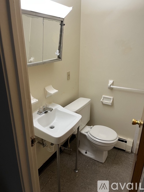A small bathroom with a toilet and sink.