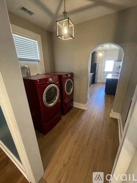 A laundry room with a washer and dryer.