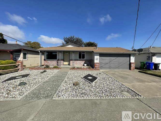A house with a driveway in front of it is for sale.