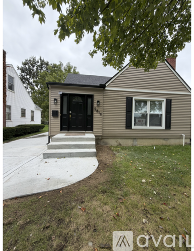 A small house with a black door and a window is shown.