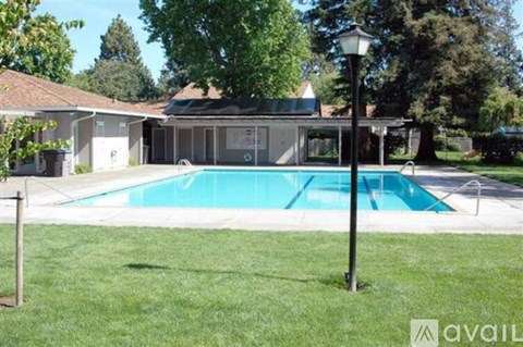 A house with a pool in the backyard.
